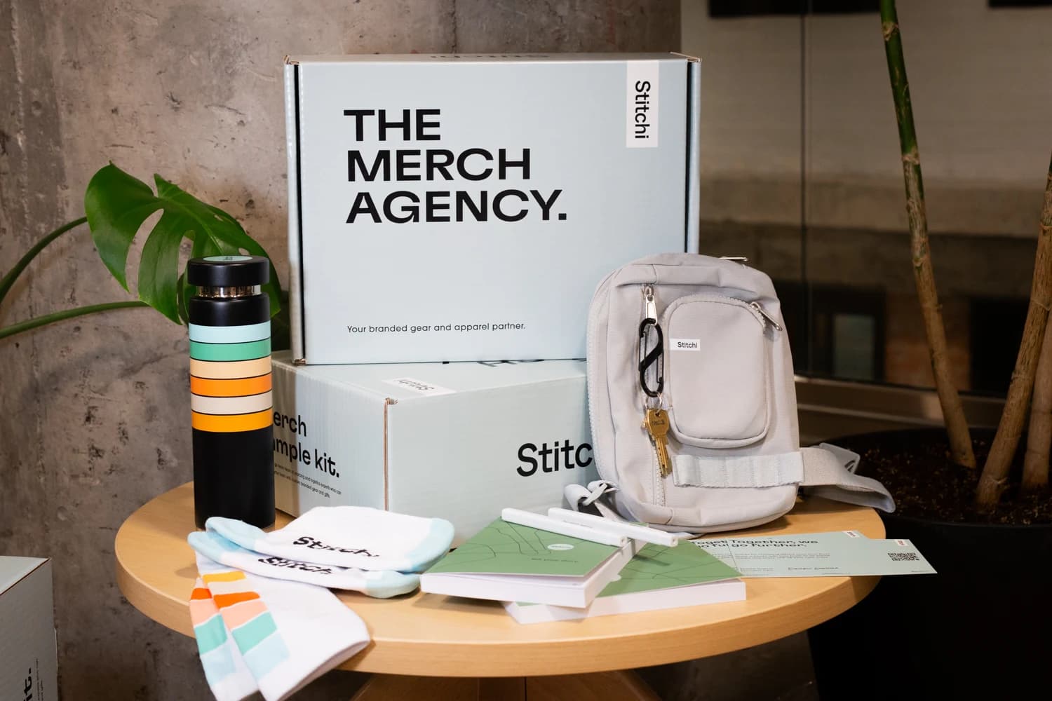 Stitchi sample kit with branded packaging and merchandise in a real setting
